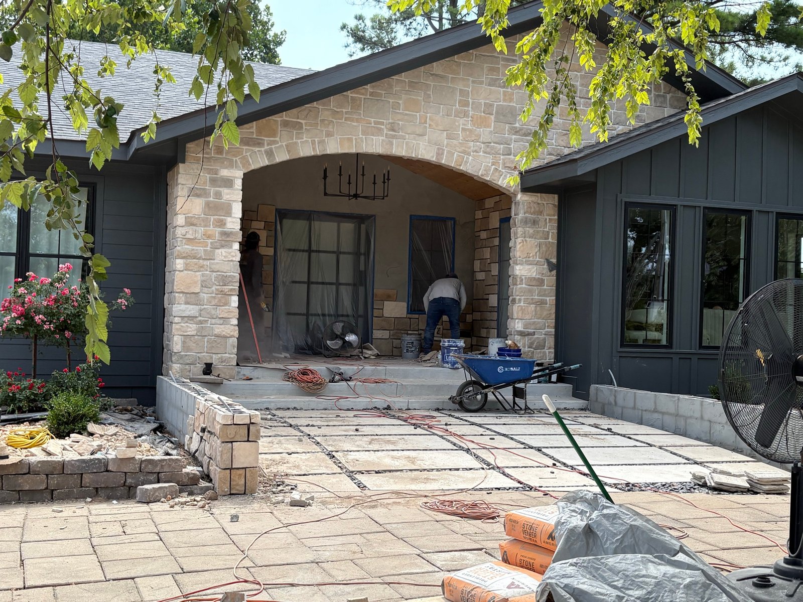 Stone veneer arched entry breezeway, alternate angle