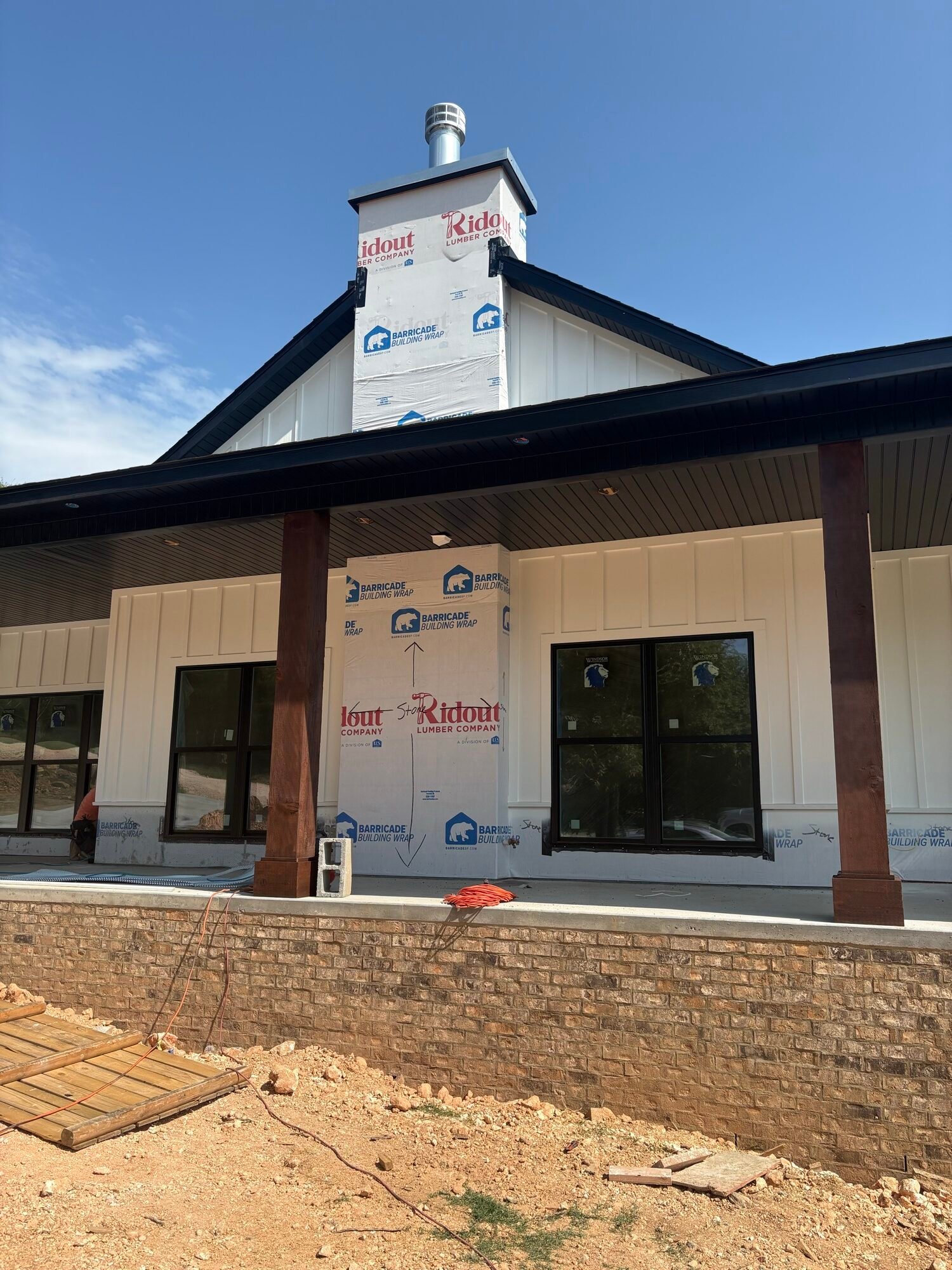 Commercial building with stone wainscot base
