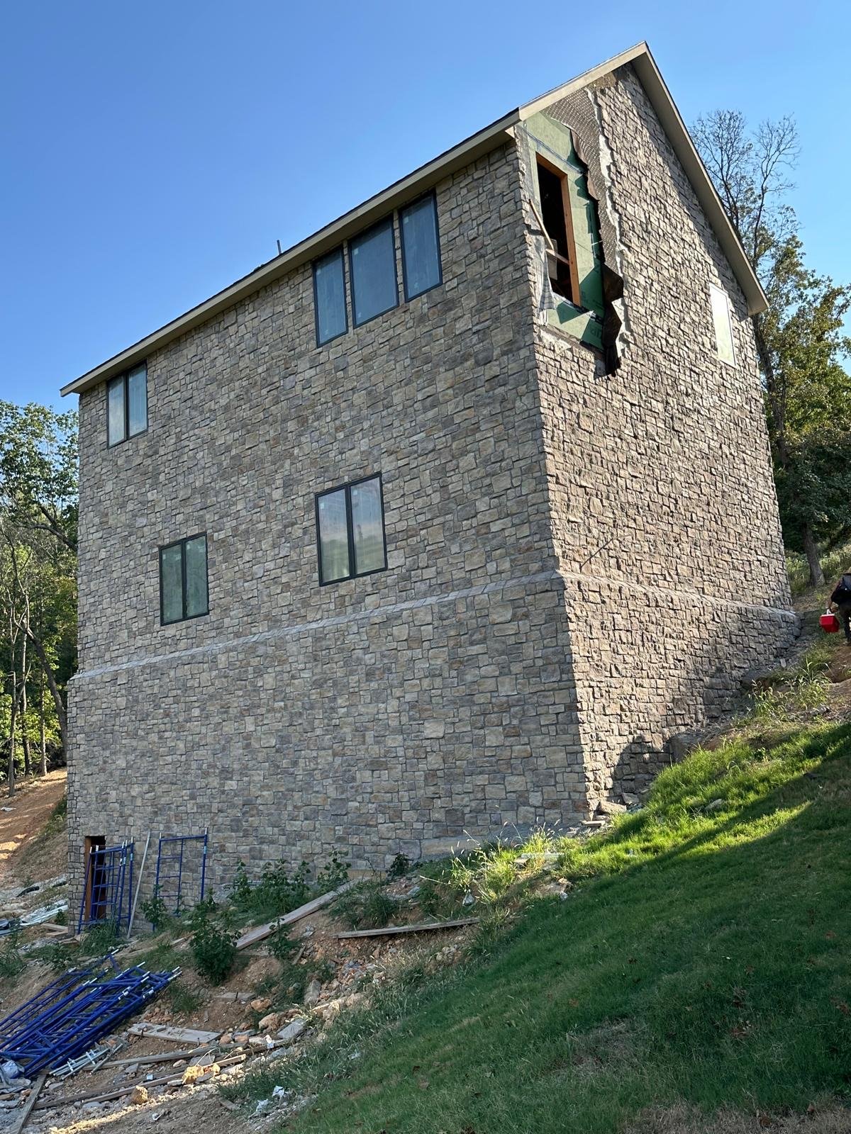 Three-Story Stone Veneer Home
