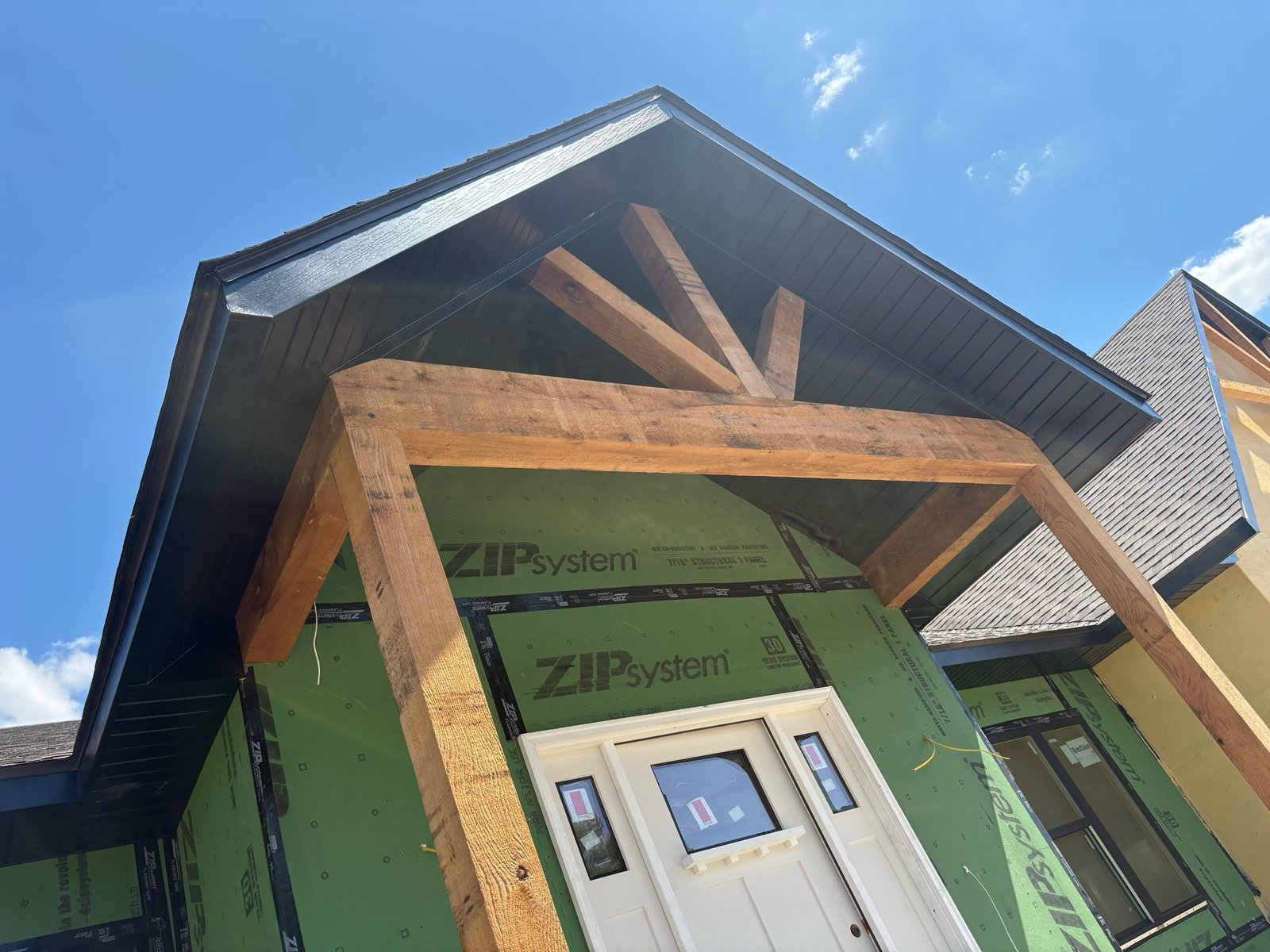 New Home Exterior — Stucco, Siding and Timber Porch